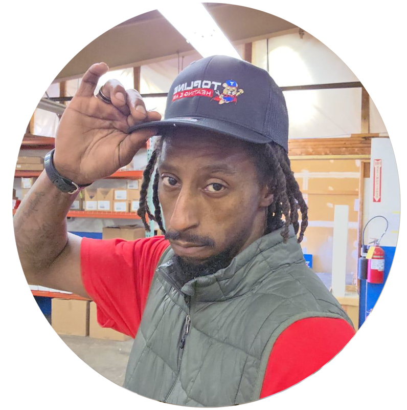 Shawan De Berry Payne working as an HVAC install apprentice at Topline Heating & Air after completing the HVAC Associate Program
